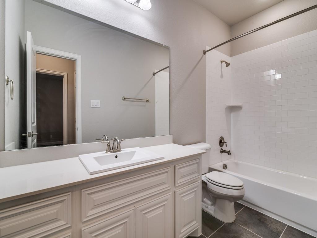 3323 Royal Ridge Drive Rockwall, TX 75087 - Photo 32 of 40 2nd level Bathroom #4 featuring shower combination, vanity, and tile patterned floors