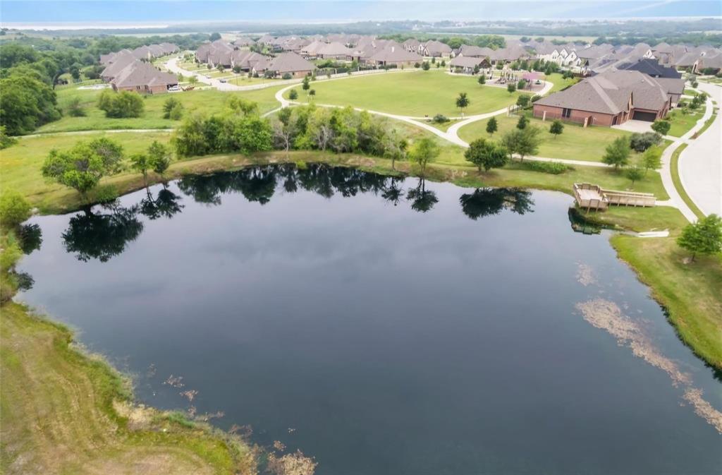 3323 Royal Ridge Drive Rockwall, TX 75087 - Photo 35 of 40 Aerial view of community pond/fishing area surrounding area.