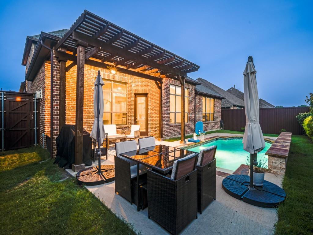 3323 Royal Ridge Drive Rockwall, TX 75087 - Photo 3 of 40 Fenced backyard with a pergola, a patio, a gate, and grilling area