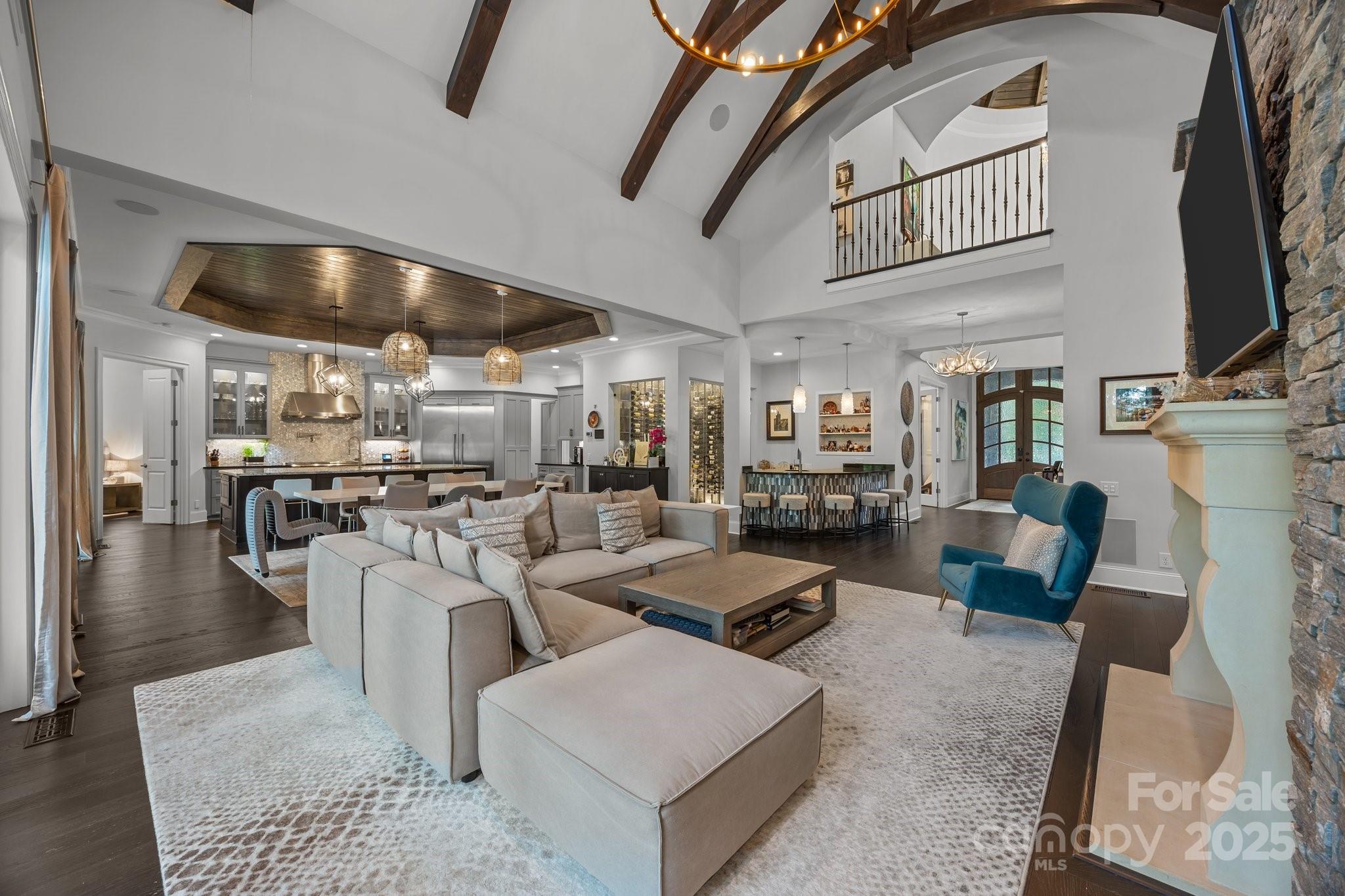 10170 Enclave Circle Concord, NC 28027 - Photo 10 of 46 a living room with furniture and a flat screen tv