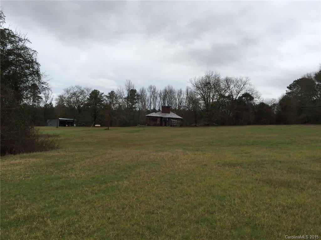 194 Old Ruby Road Morven, NC 28119 - Photo 17 of 17 a view of a field of grass and trees