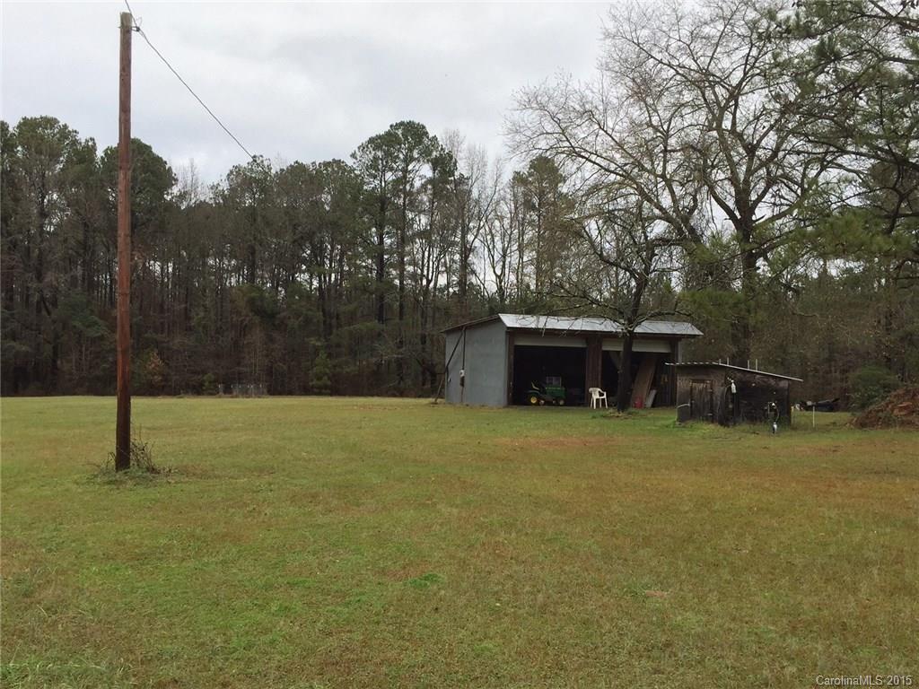 194 Old Ruby Road Morven, NC 28119 - Photo 3 of 17 a fire hydrant in the middle of a field