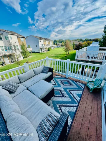 a view of a patio with couches chairs and a table
