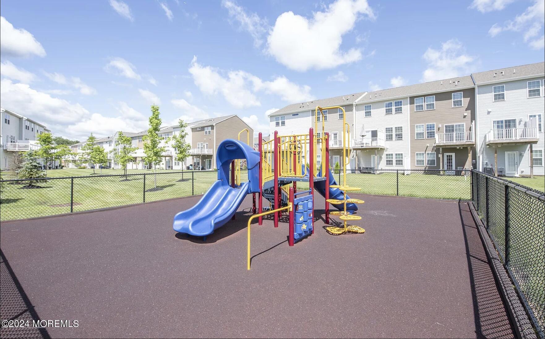 115 Beacon Lane, Unit 402 Eatontown, NJ 07724 - Photo 8 of 27 a play room with furniture
