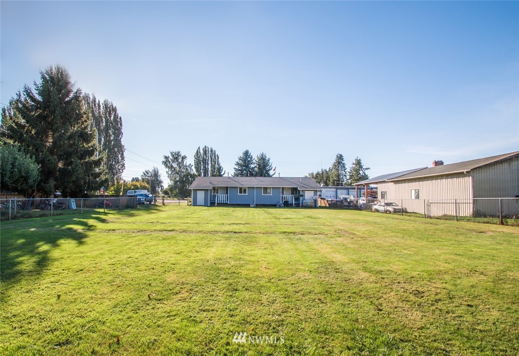 15467 Beaver Marsh Road Mount Vernon, WA 98273 - Photo 3 of 23 a view of a large pool with an ocean view