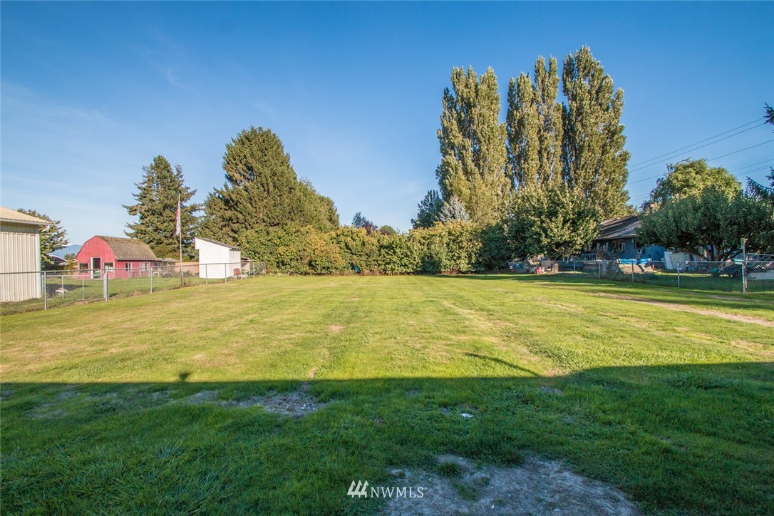 15467 Beaver Marsh Road Mount Vernon, WA 98273 - Photo 22 of 23 a swimming pool with an outdoor space and seating area