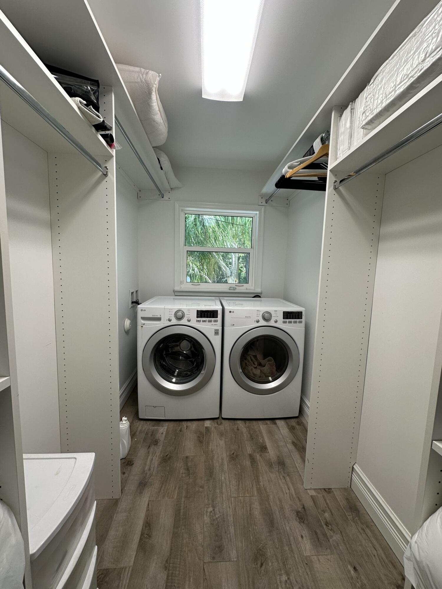 2415 Laurel Lane Palm Beach Gardens, FL 33410 - Photo 13 of 18 a utility room with dryer and washer