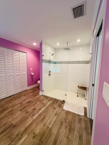 a bathroom with a sink and a shower