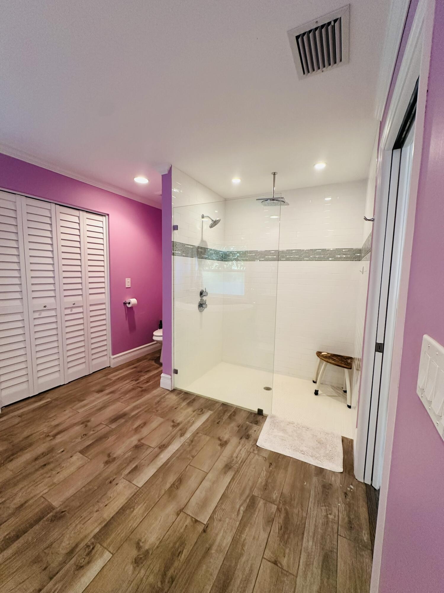 2415 Laurel Lane Palm Beach Gardens, FL 33410 - Photo 18 of 18 a bathroom with a sink and a shower