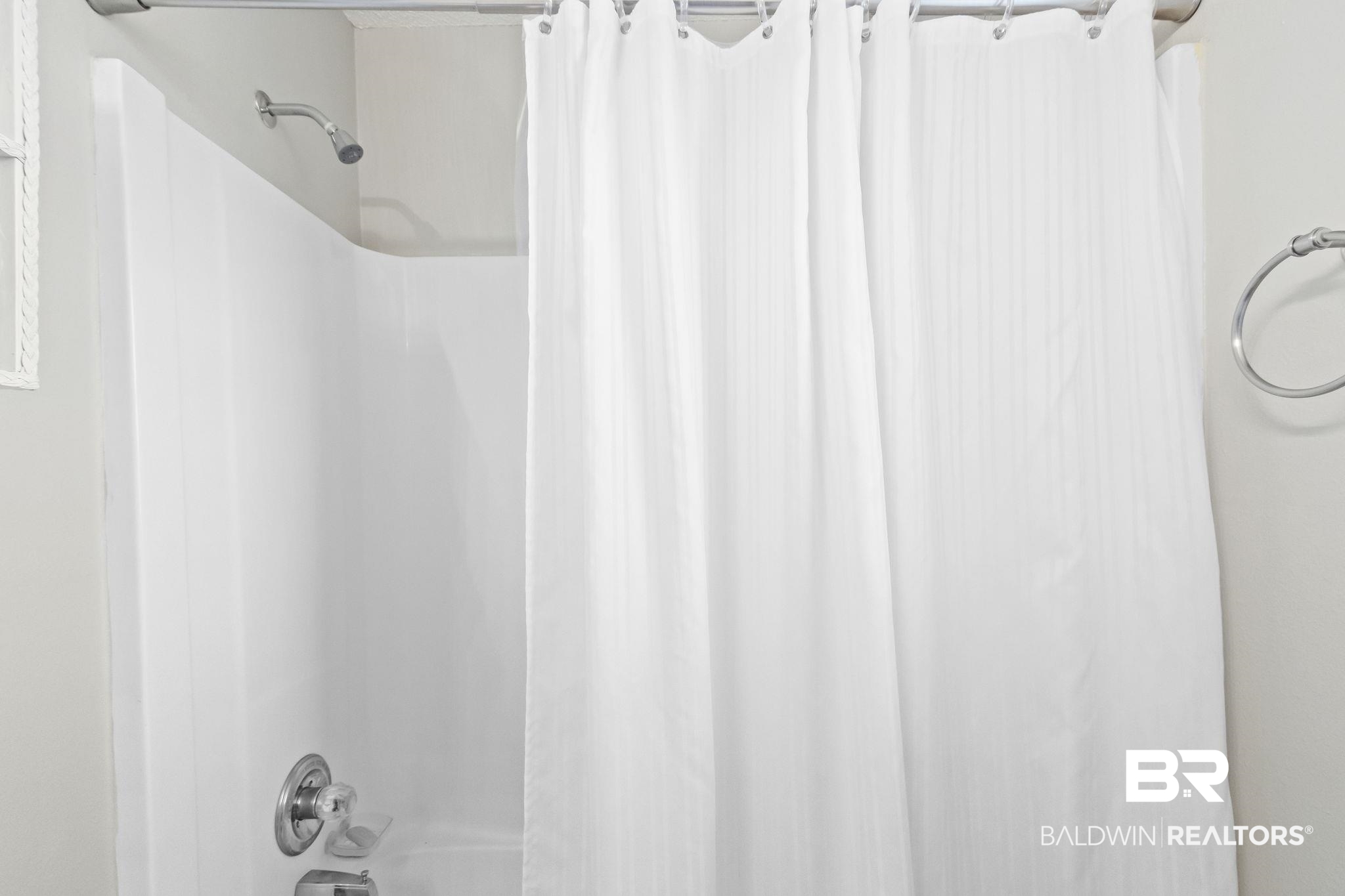 14031 Brook Hollow Road Summerdale, AL 36580 - Photo 31 of 56 Bathroom featuring shower / tub combo with curtain