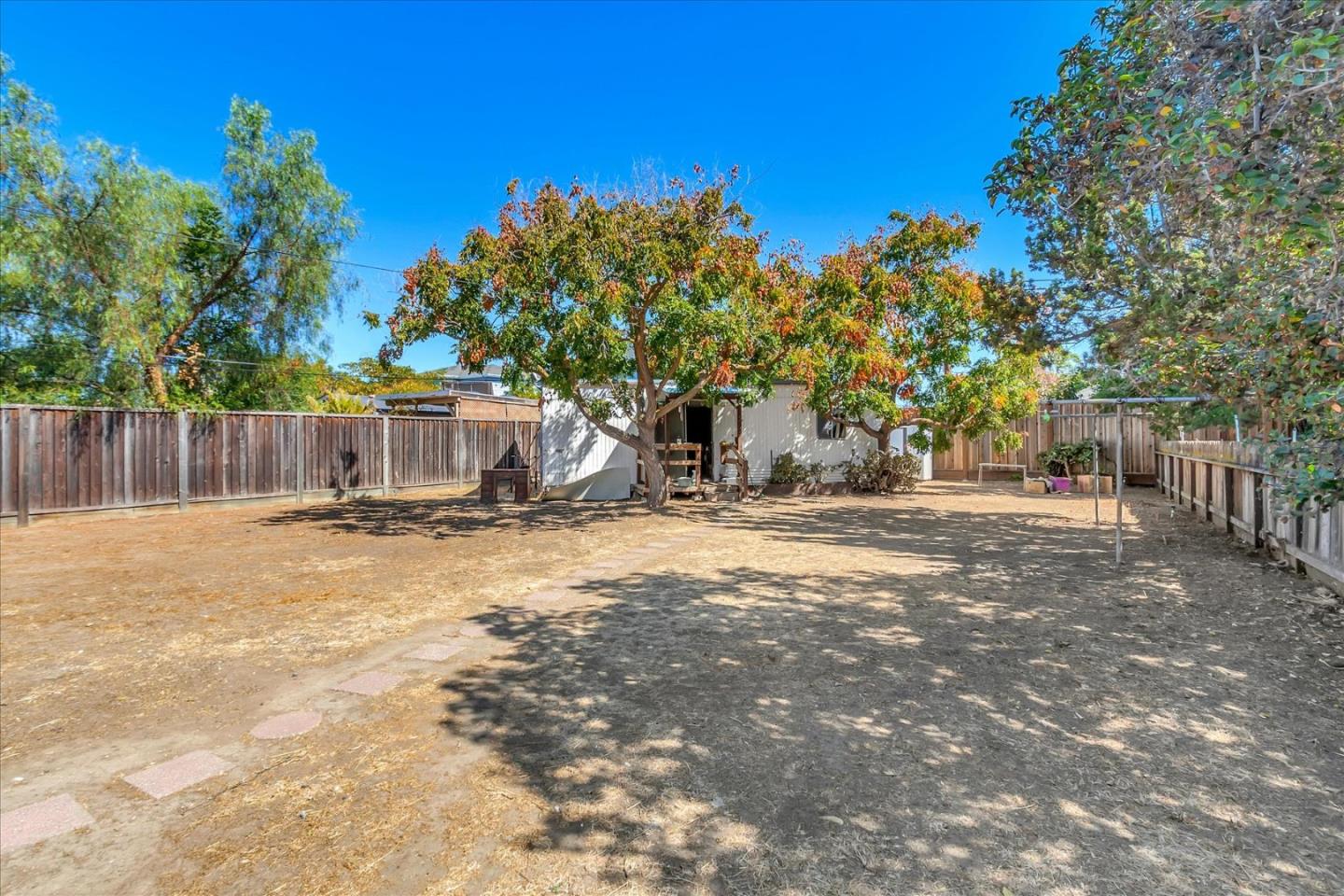 1290 Hoffman Lane Campbell, CA 95008 - Photo 3 of 5 a view of a yard with a table and chairs