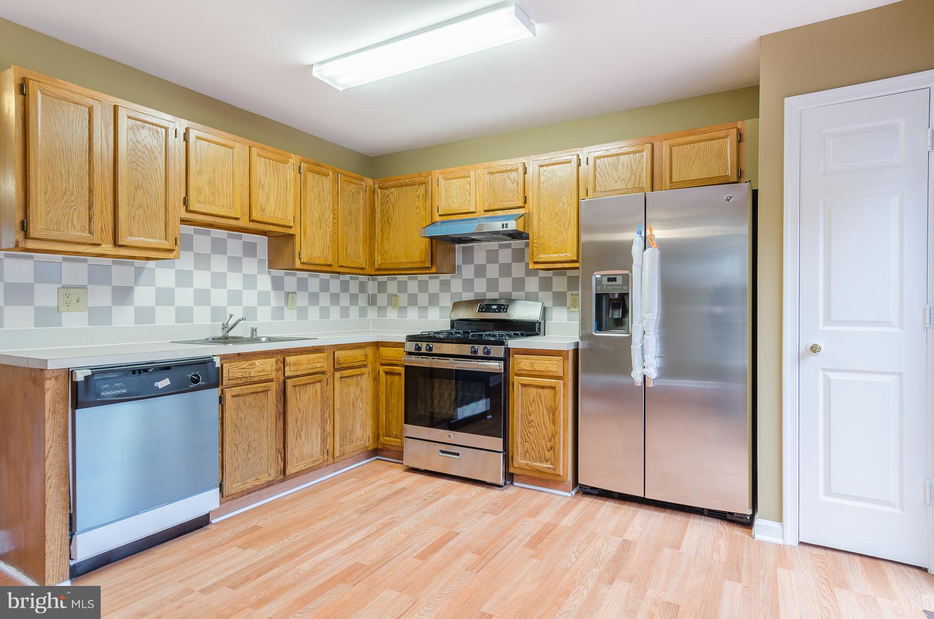 5 Maya Way Baltimore, MD 21237 - Photo 7 of 30 Kitchen w/ Dining Area