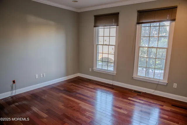 a view of entryway with a chandelier