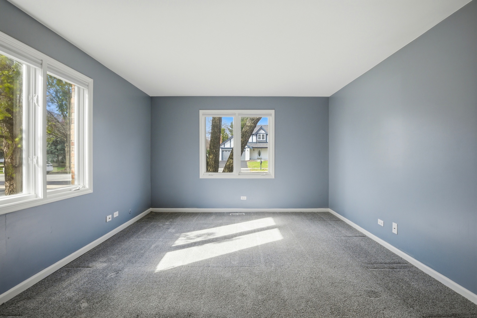 622 Zaininger Avenue, Unit A Naperville, IL 60563 - Photo 16 of 30 an empty room with windows