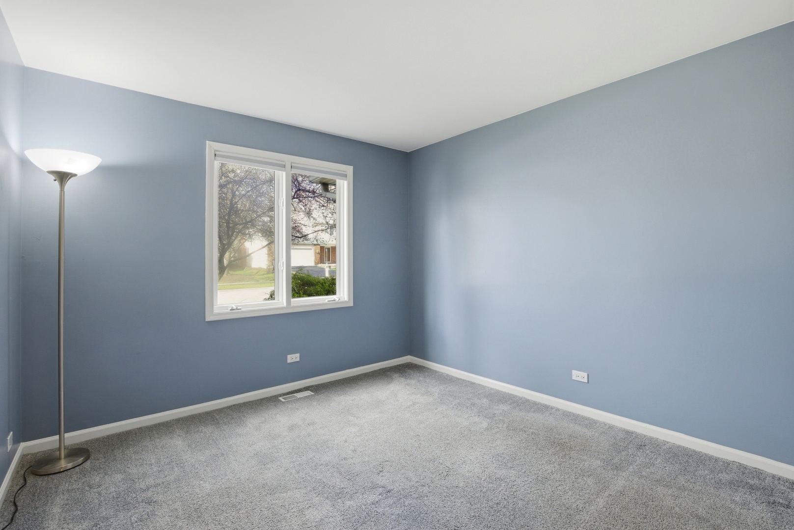 622 Zaininger Avenue, Unit A Naperville, IL 60563 - Photo 20 of 30 an empty room with windows