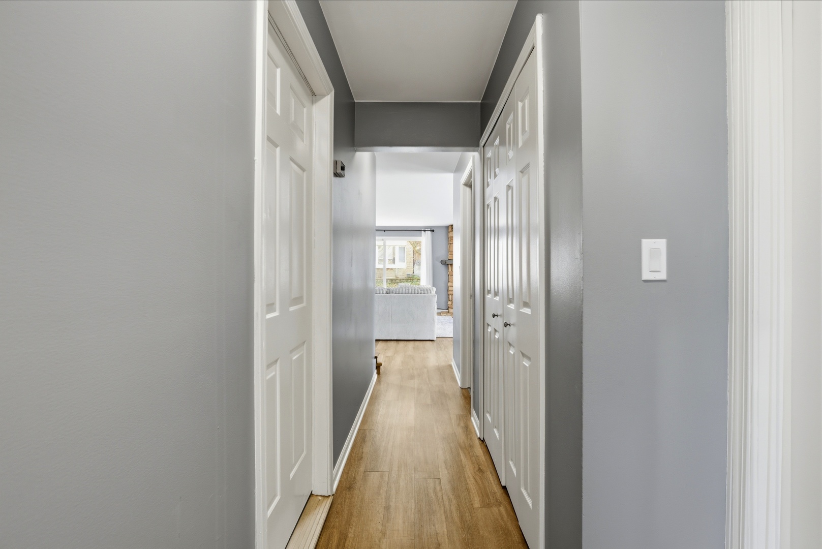 622 Zaininger Avenue, Unit A Naperville, IL 60563 - Photo 24 of 30 a view of a hallway with wooden floor and glass door