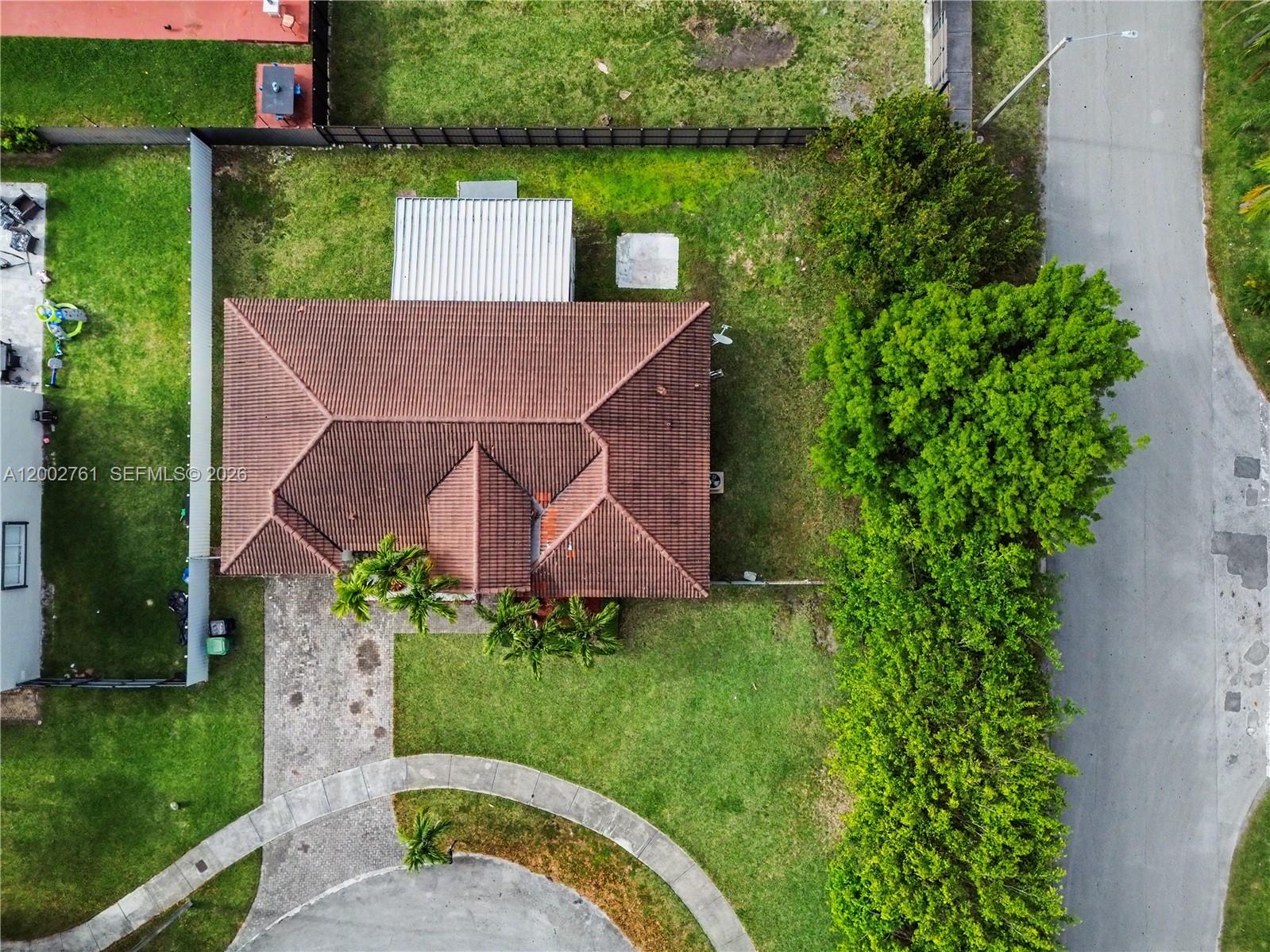 14264 Southwest 289th Terrace Homestead, FL 33033 - Photo 21 of 23 an aerial view of a house