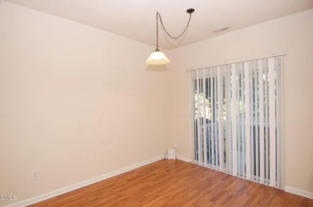 a very nice looking room with a wooden floor