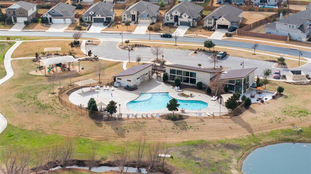 420 White Steppe Way Georgetown, TX 78626 - Photo 27 of 29 View of walking paths, clubhouse, pool and disc golf course