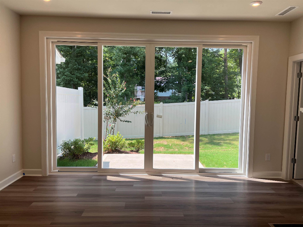 7809 Sofiana Avenue Raleigh, NC 27617 - Photo 12 of 20 a view of a garden from a window