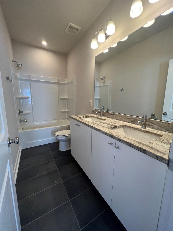 7809 Sofiana Avenue Raleigh, NC 27617 - Photo 17 of 20 a bathroom with a double vanity sink and a mirror