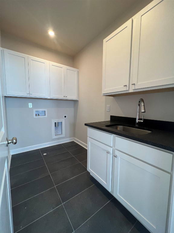 7809 Sofiana Avenue Raleigh, NC 27617 - Photo 18 of 20 a kitchen with granite countertop white cabinets and sink
