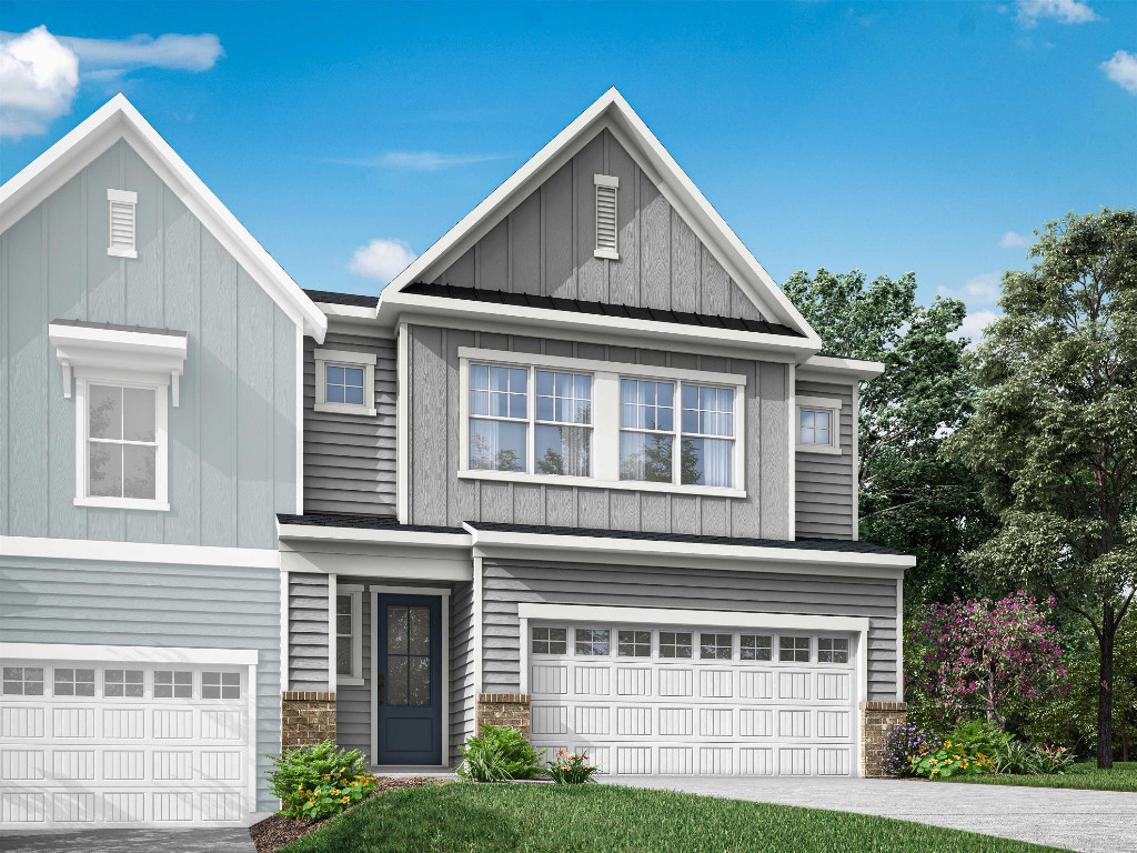 7809 Sofiana Avenue Raleigh, NC 27617 - Photo 2 of 20 a front view of a house with a yard