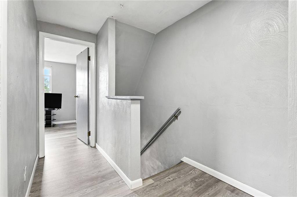 553 Indus Street Pittsburgh, PA 15207 - Photo 14 of 41 a view of a livingroom with a hallway