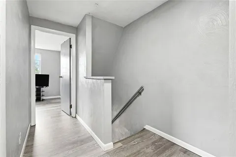 a view of a livingroom with a hallway