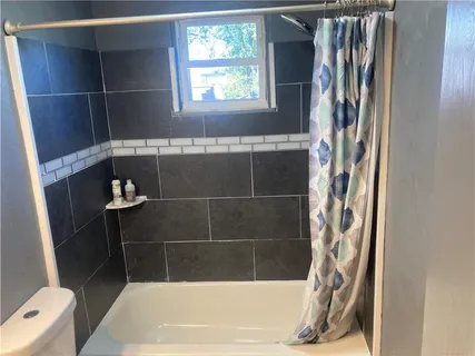 a bathroom with a bathtub