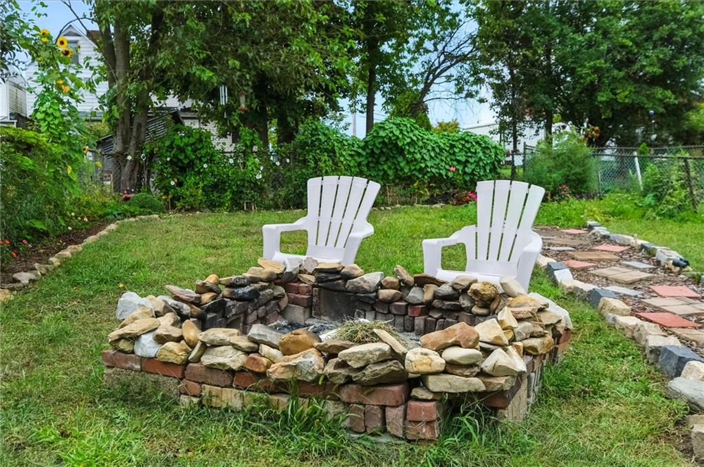 553 Indus Street Pittsburgh, PA 15207 - Photo 33 of 41 a view of a chair and fire pit in the garden