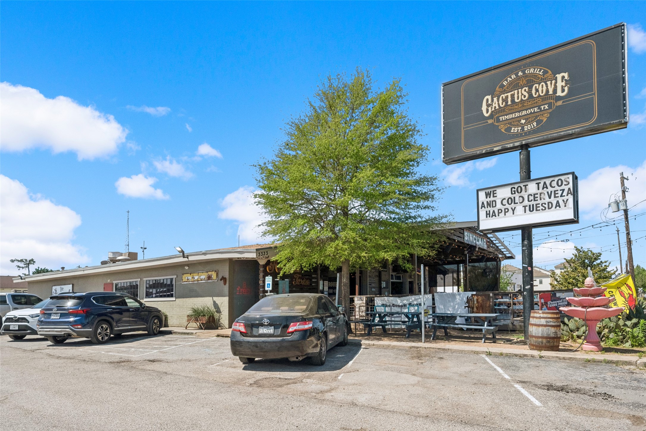 1408 Enid Street, Unit A Houston, TX 77009 - Photo 26 of 28 a view of parking with cars parked