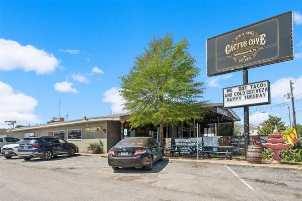 a view of a park both side of a road