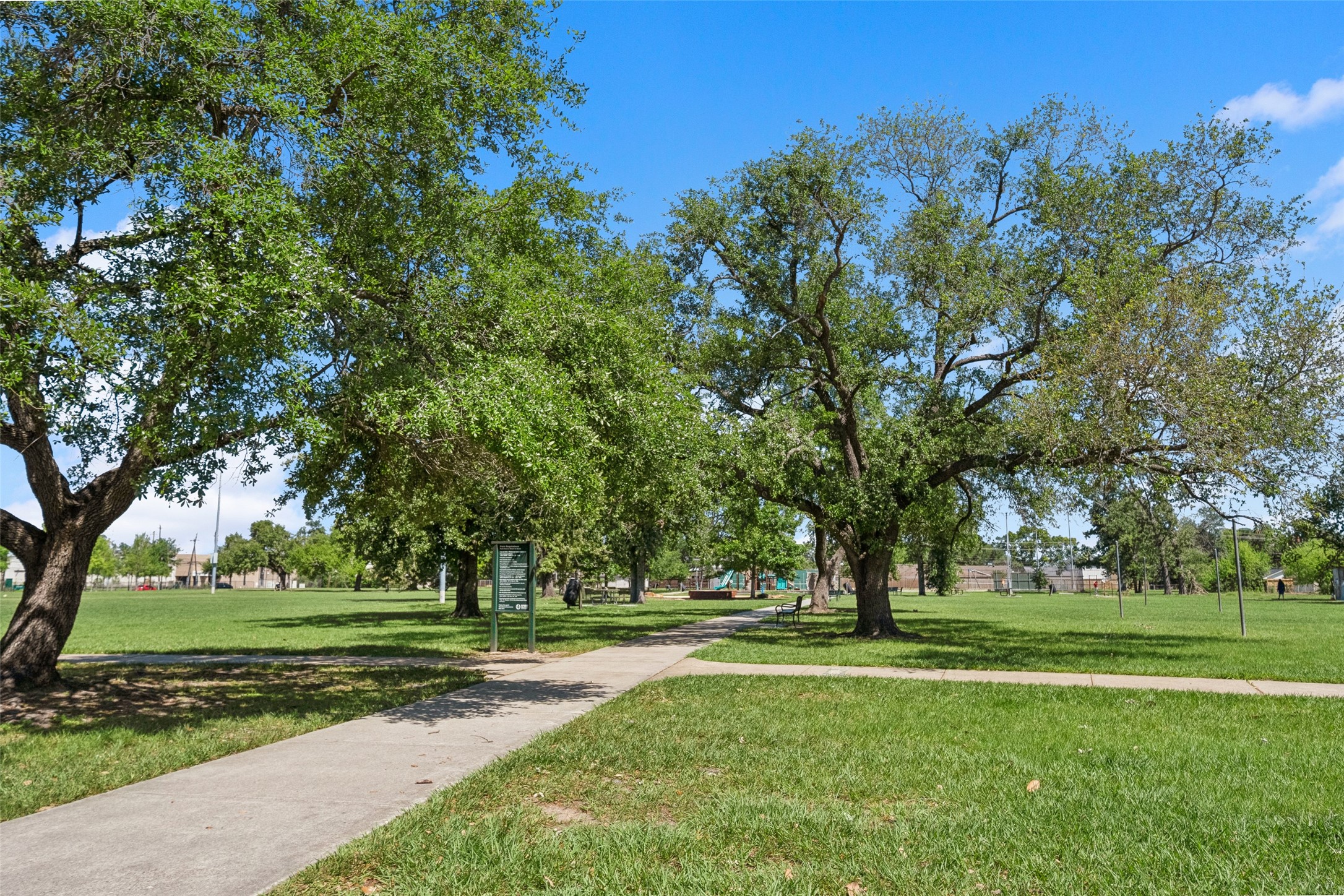 1408 Enid Street, Unit A Houston, TX 77009 - Photo 28 of 28 a huge green field with lots of trees