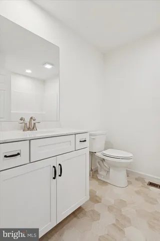 a view of a hallway with staircase