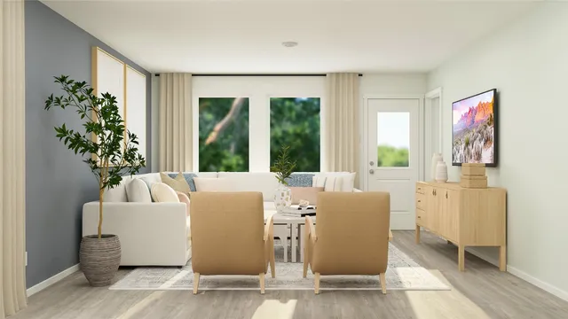 a living room with furniture and a large window