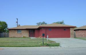 5340 Capulin Lane Amarillo, TX 79110 - Photo 1 of 1 a front view of a house with a yard