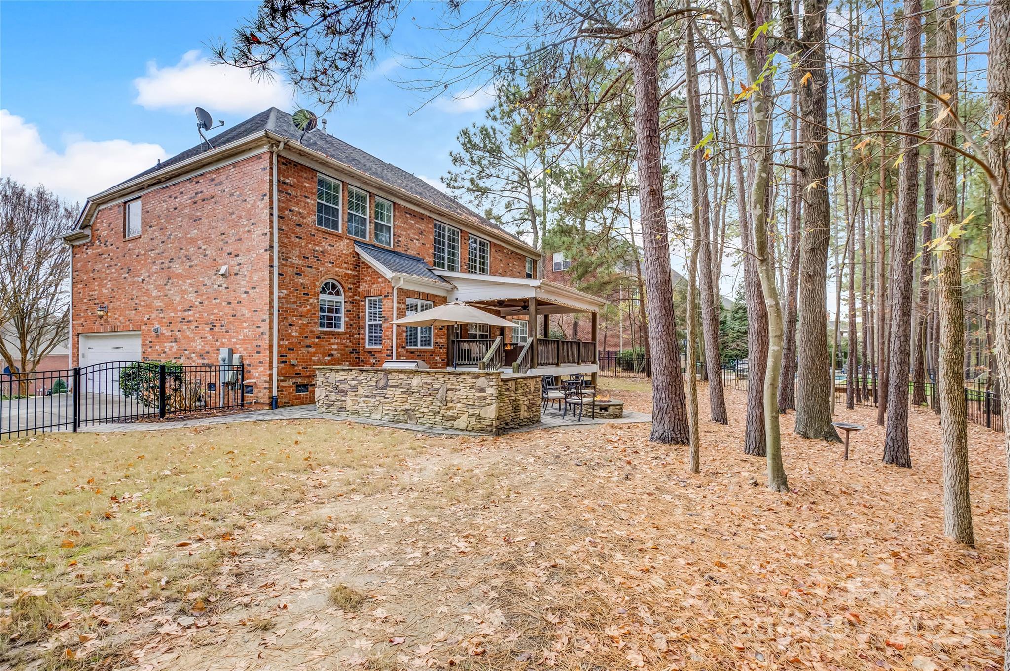 16645 Turtle Point Road Charlotte, NC 28278 - Photo 43 of 48 a view of a house with a yard covered in snow