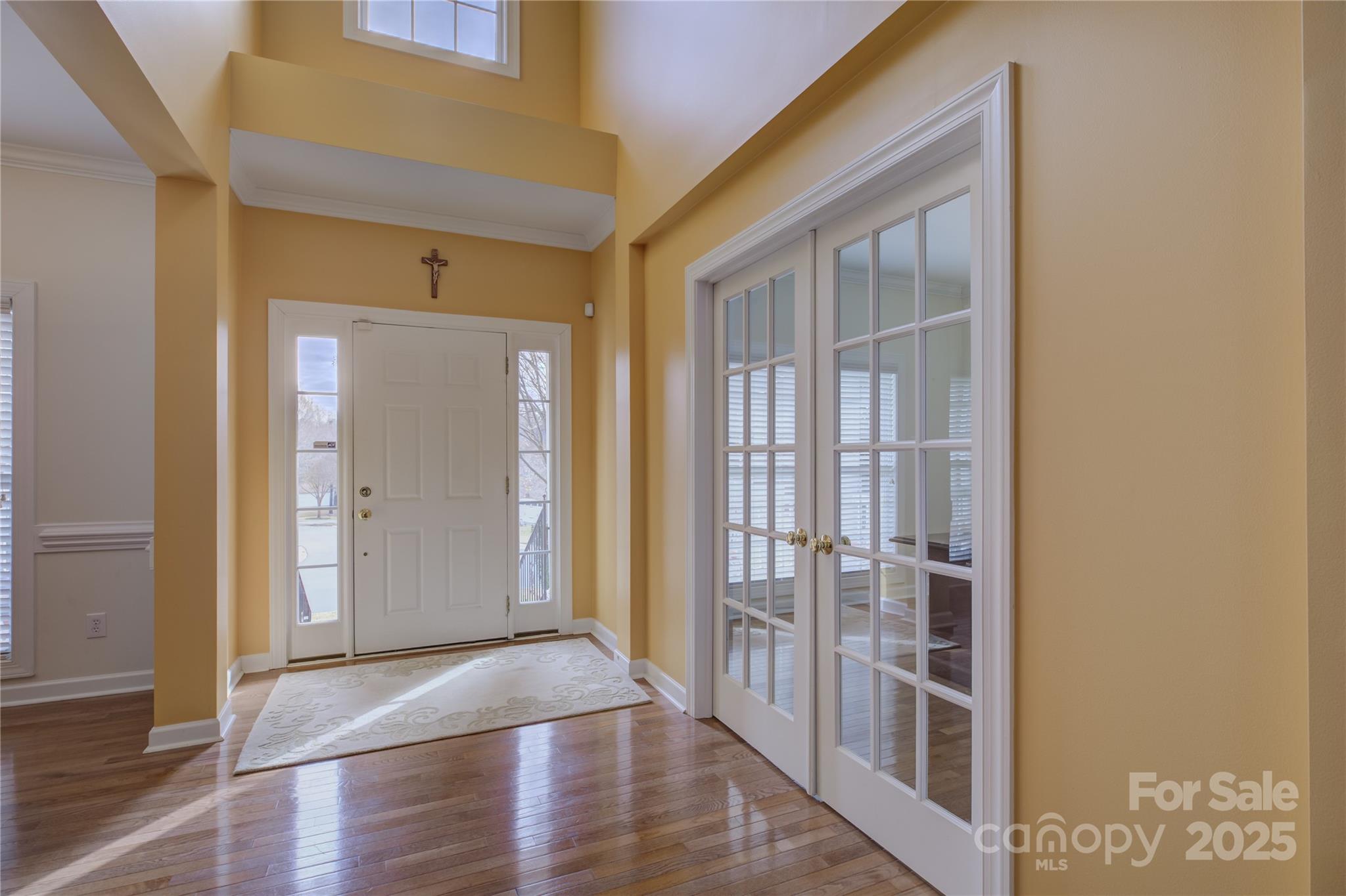 16645 Turtle Point Road Charlotte, NC 28278 - Photo 6 of 48 a view of a hallway with wooden floor and entryway