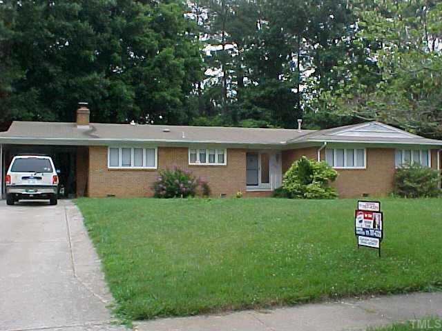 4720 Latimer Road Raleigh, NC 27609 - Photo 1 of 1 a view of a house with a yard