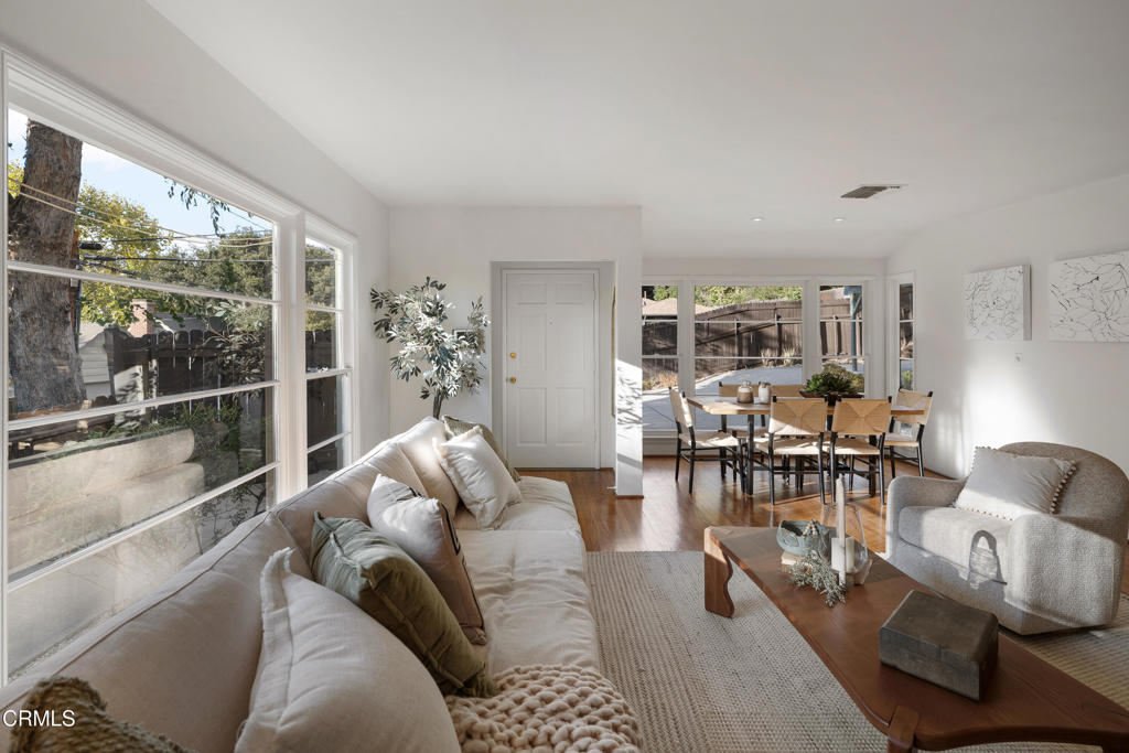 3624 Canyon Crest Road Altadena, CA 91001 - Photo 12 of 57 a living room with furniture and a large window