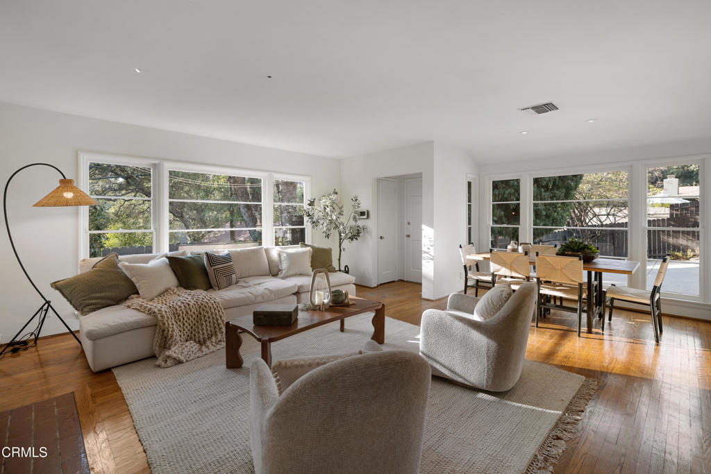 3624 Canyon Crest Road Altadena, CA 91001 - Photo 13 of 57 a living room with furniture and a large window