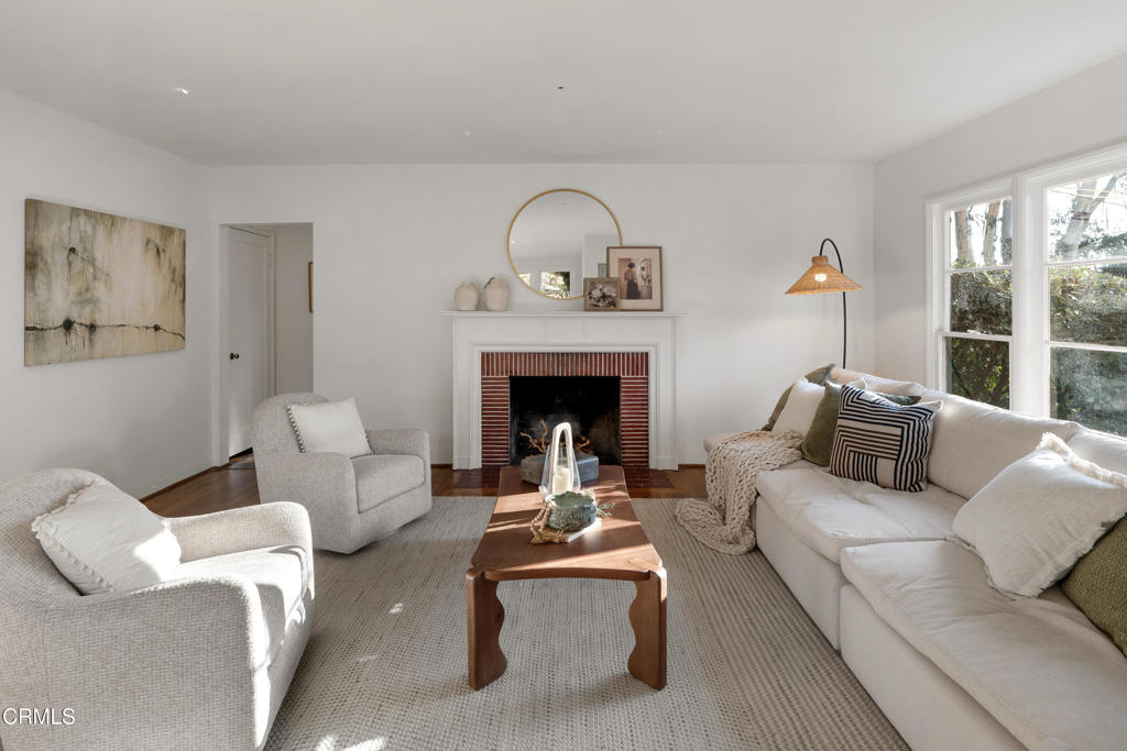 3624 Canyon Crest Road Altadena, CA 91001 - Photo 15 of 57 a living room with furniture fireplace and window