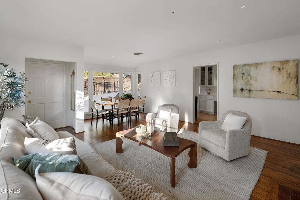 3624 Canyon Crest Road Altadena, CA 91001 - Photo 16 of 57 a living room with furniture and wooden floor