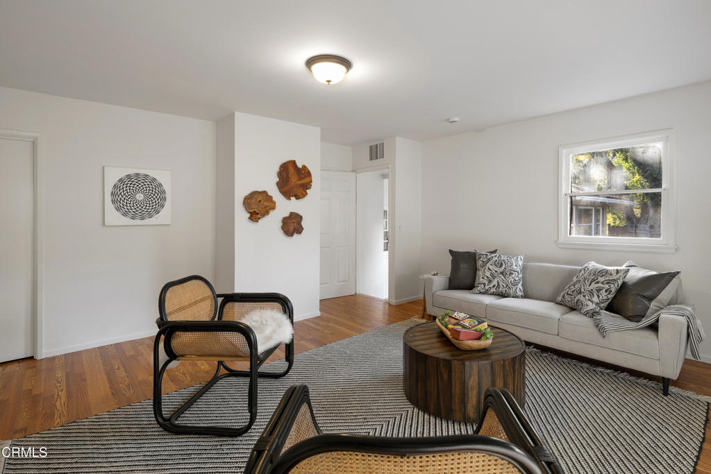 3624 Canyon Crest Road Altadena, CA 91001 - Photo 27 of 57 a living room with furniture and window