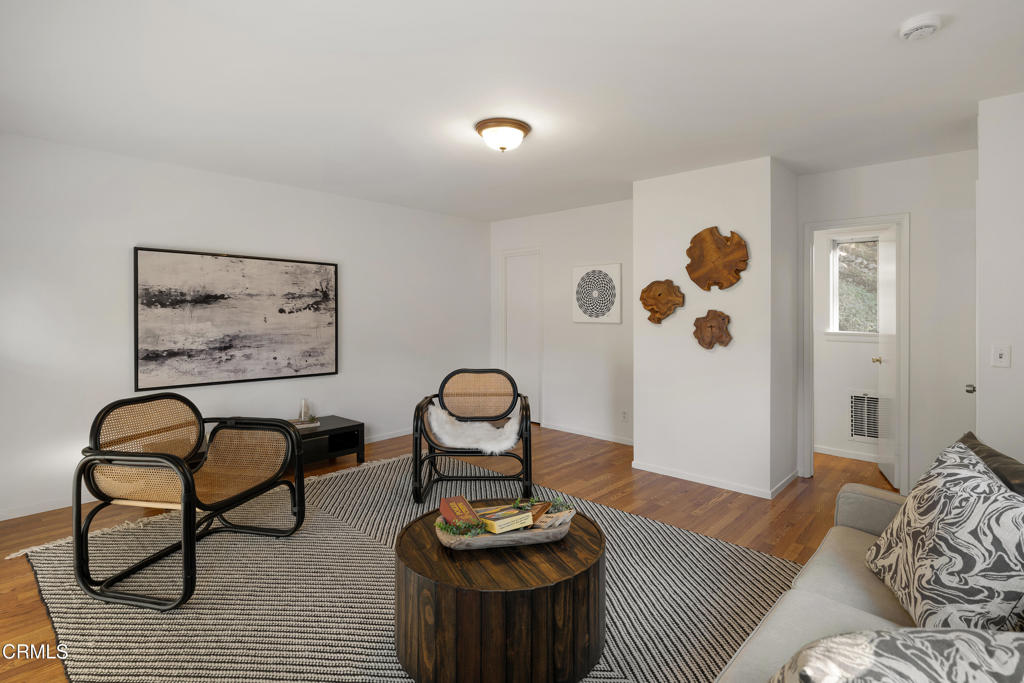 3624 Canyon Crest Road Altadena, CA 91001 - Photo 28 of 57 a living room with furniture and window