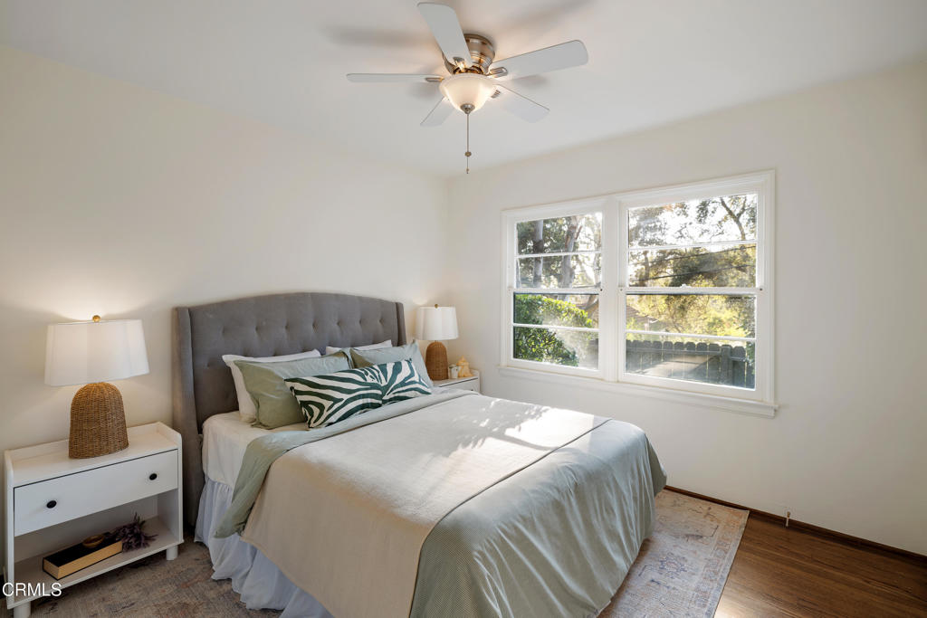 3624 Canyon Crest Road Altadena, CA 91001 - Photo 30 of 57 a bedroom with a bed and a window