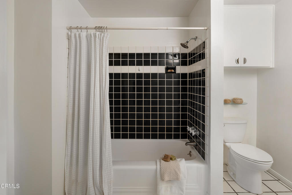 3624 Canyon Crest Road Altadena, CA 91001 - Photo 33 of 57 a bathroom with a toilet and shower