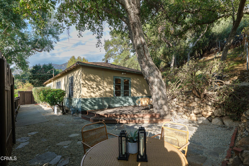 3624 Canyon Crest Road Altadena, CA 91001 - Photo 39 of 57 a backyard of a house with table and chairs