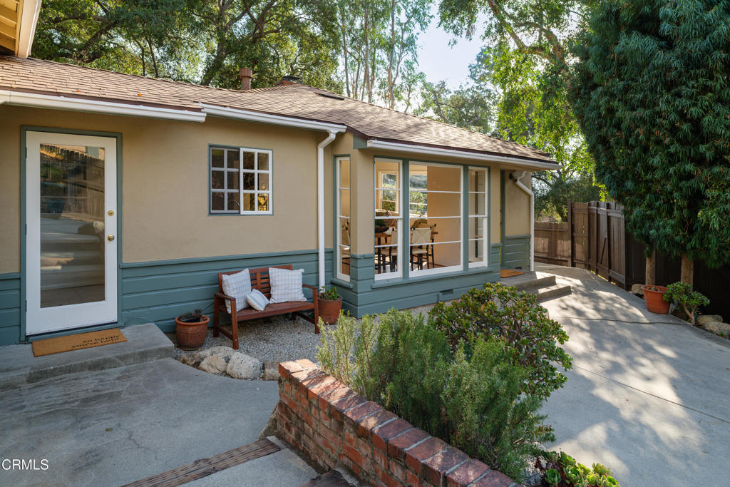 3624 Canyon Crest Road Altadena, CA 91001 - Photo 9 of 57 a view of a house with backyard sitting area and garden